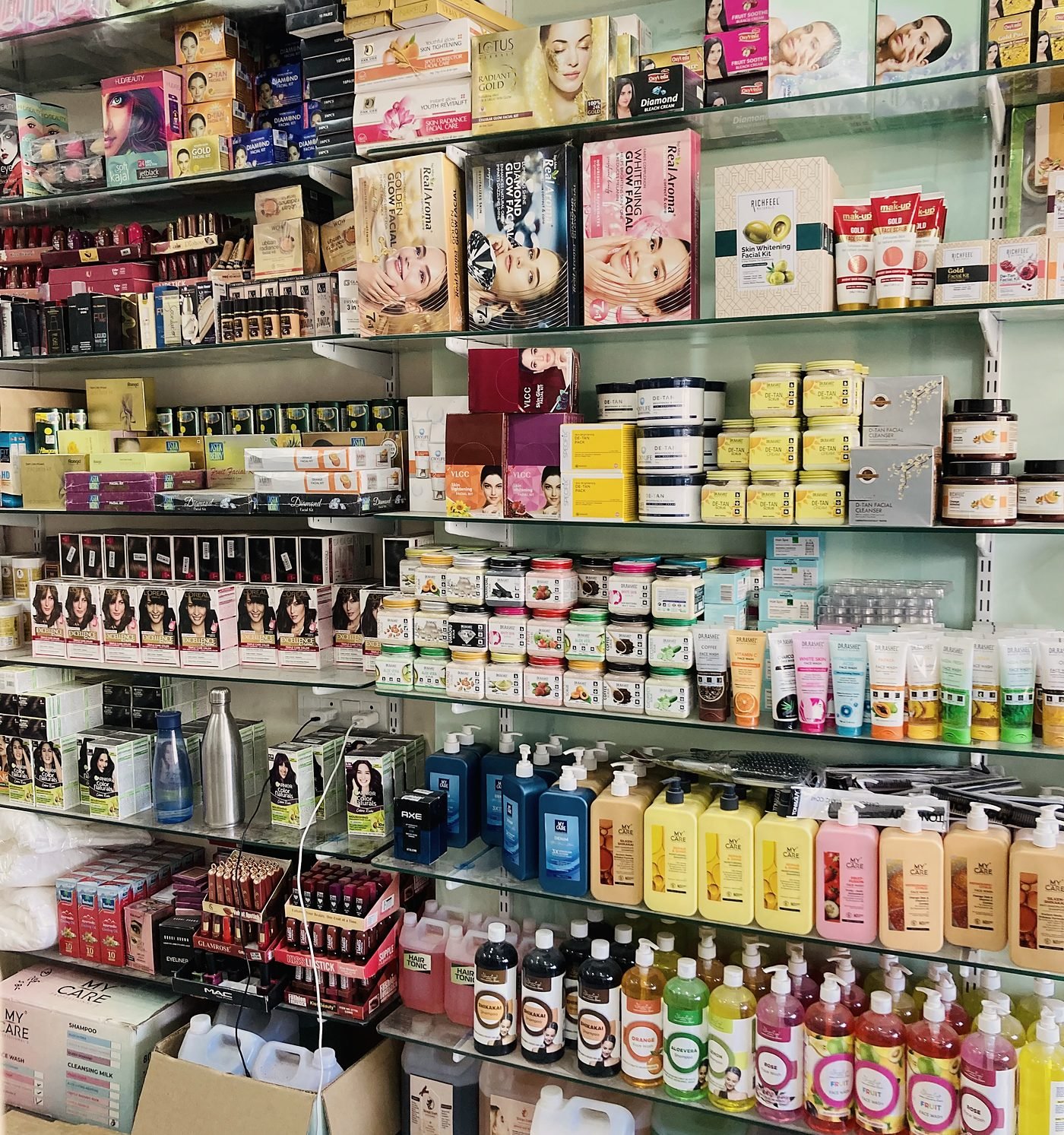 Shelves stocked with hair colour, skincare and personal care products